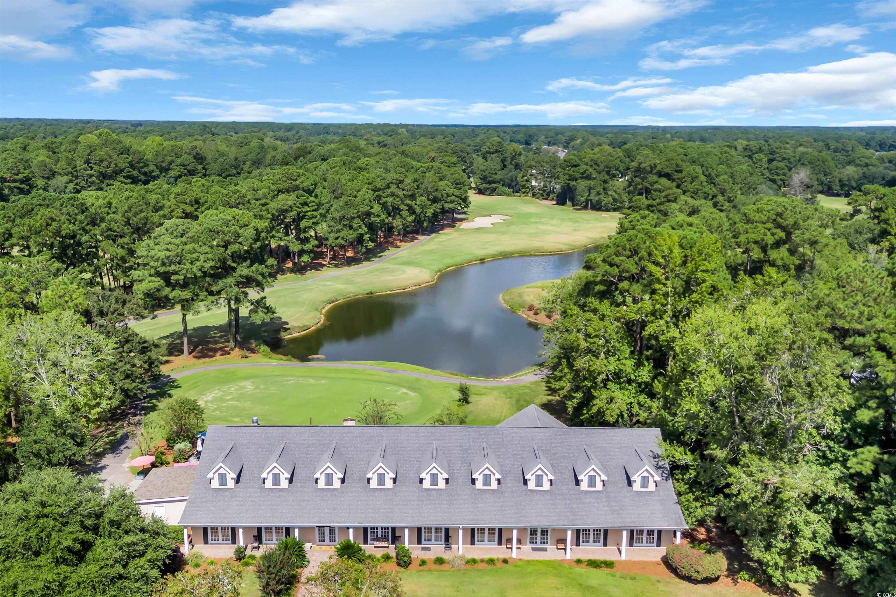 9350 Pinckney Lane Murrells Inlet, SC 29576 - Photo 39 of 40 Bird's eye view of a golf course and a nearby body of water
