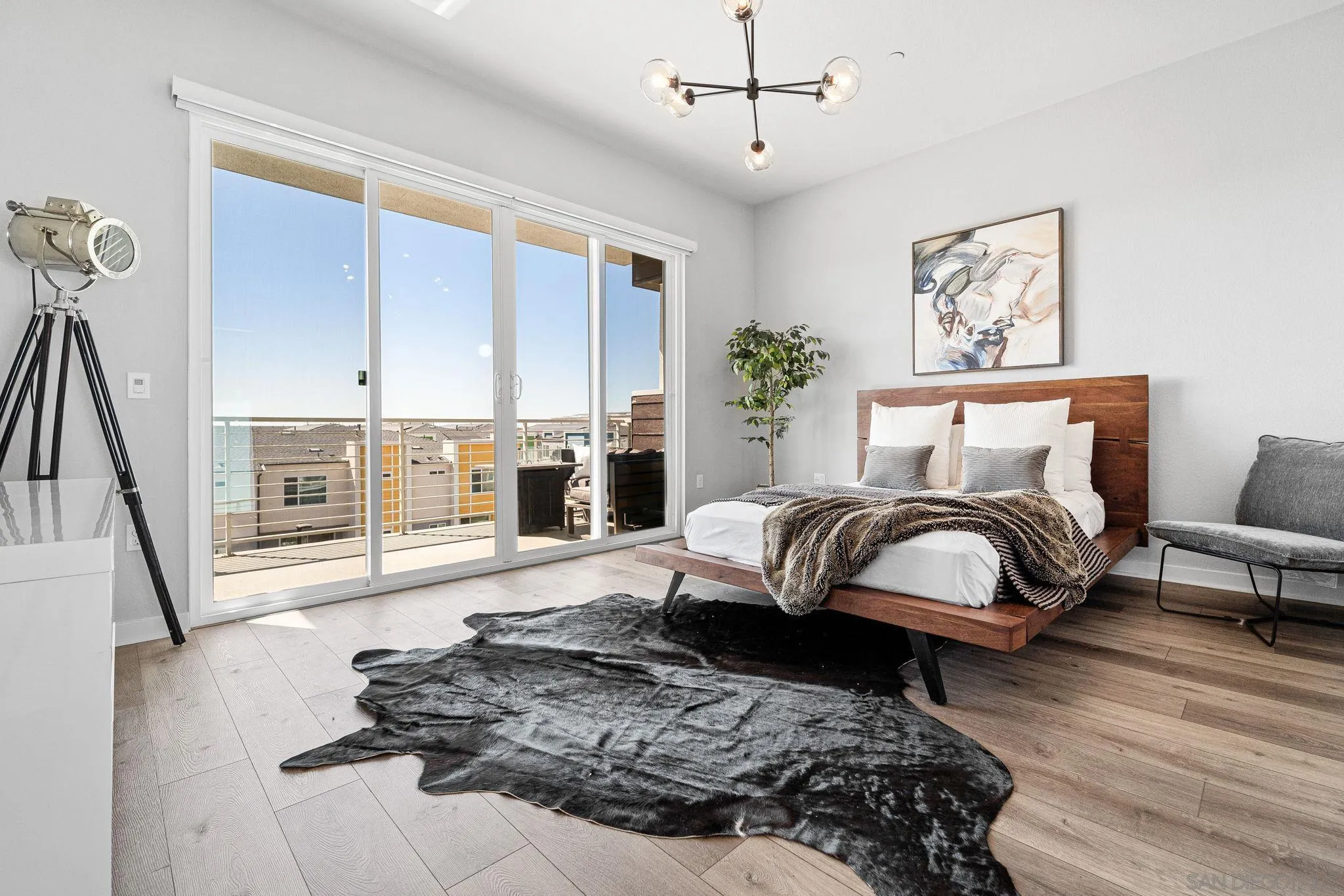 3002 Bravo Loop, Unit 4 Chula Vista, CA 91915 - Photo 24 of 38 a living room with furniture and a large window