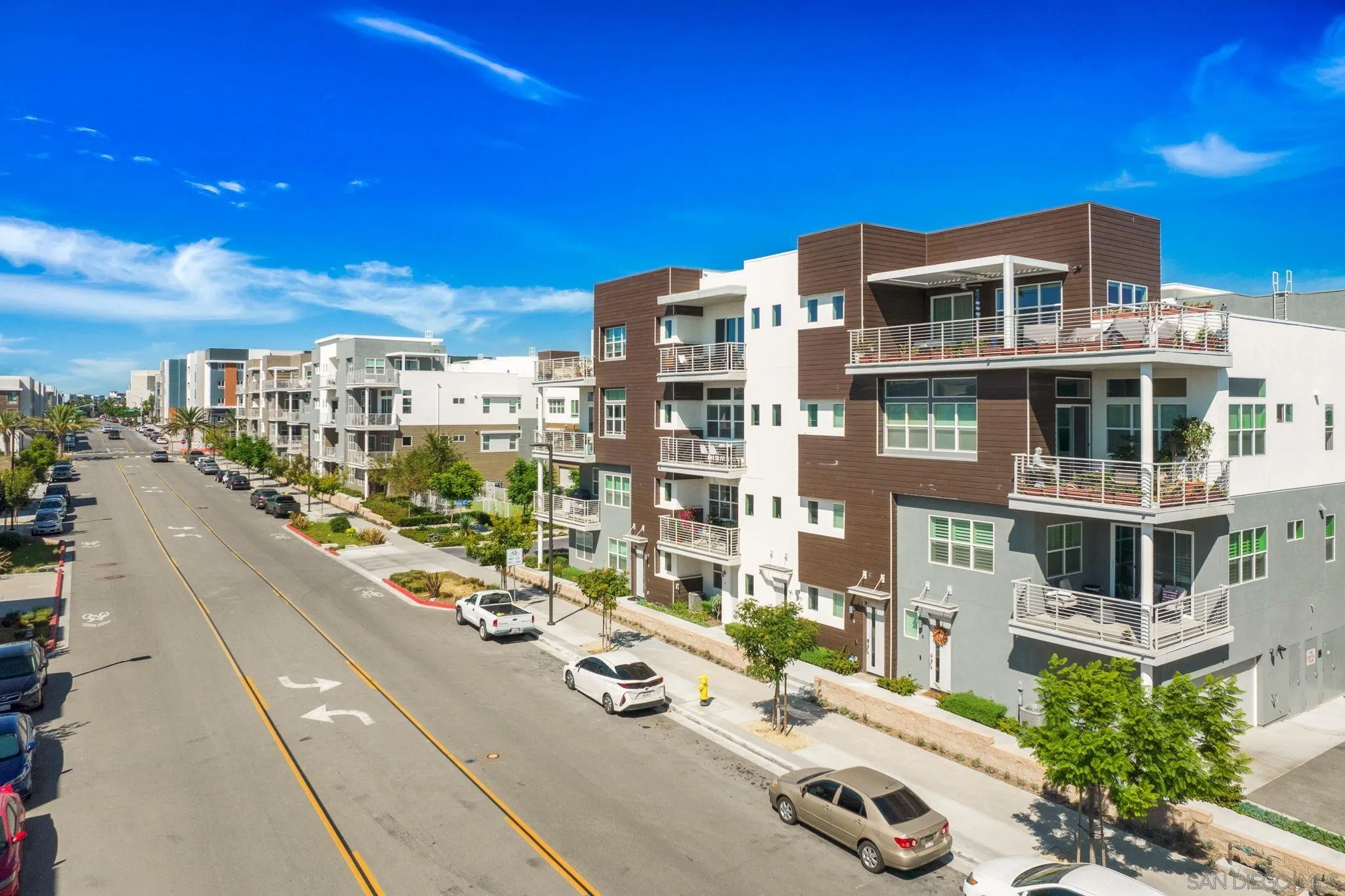 3002 Bravo Loop, Unit 4 Chula Vista, CA 91915 - Photo 32 of 38 a view of a city with tall buildings