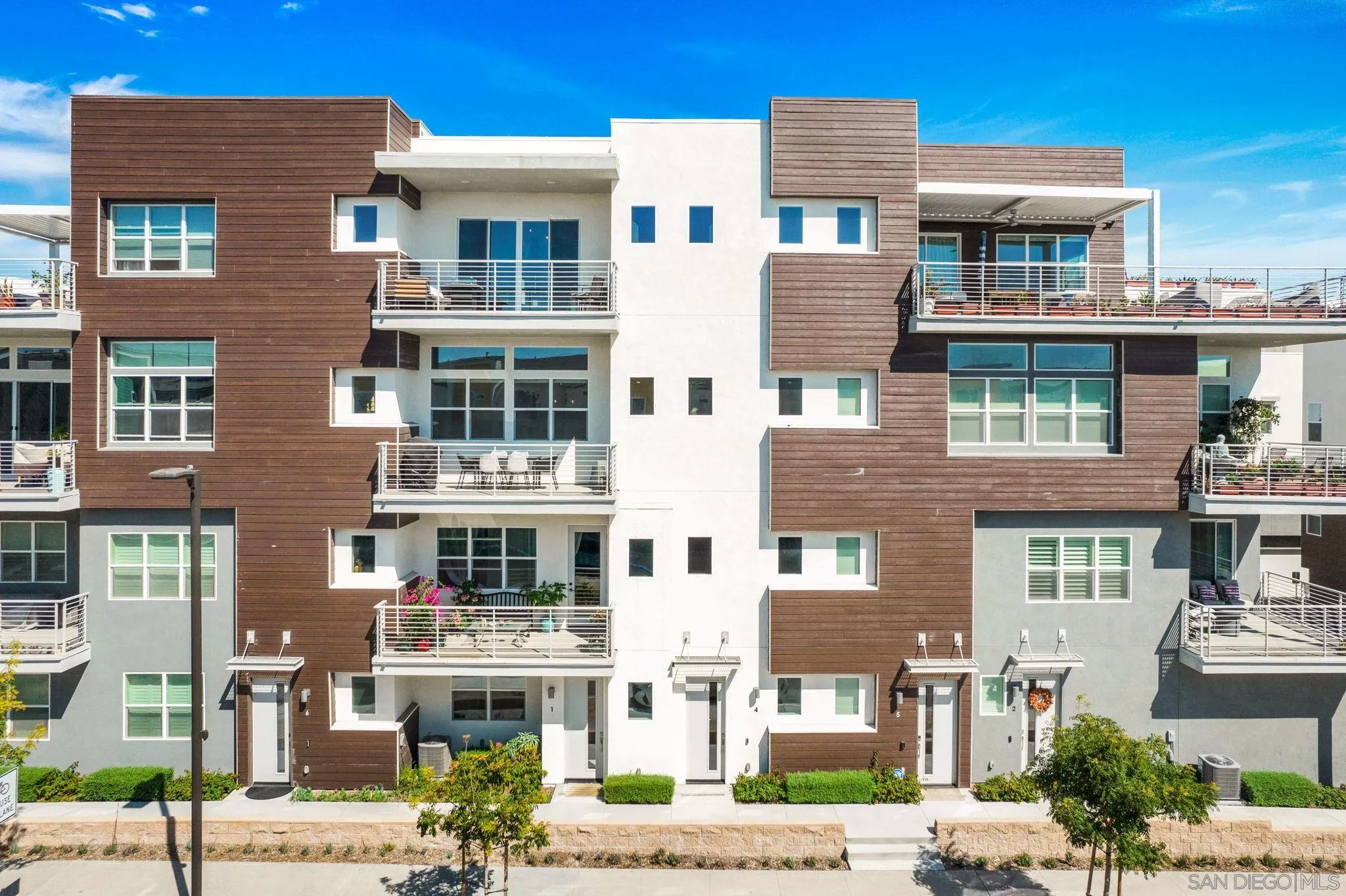 3002 Bravo Loop, Unit 4 Chula Vista, CA 91915 - Photo 33 of 38 a front view of a multi story building