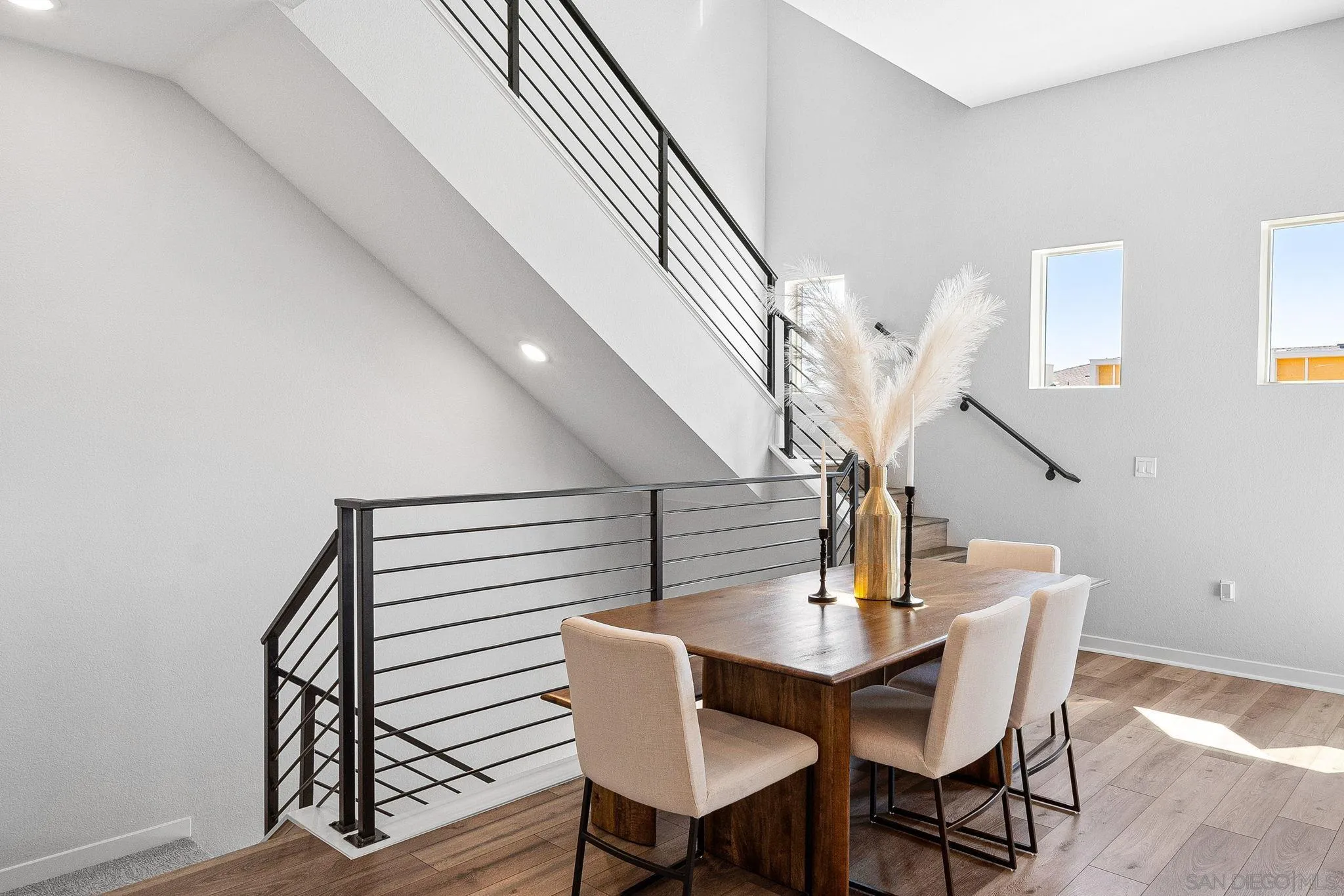 3002 Bravo Loop, Unit 4 Chula Vista, CA 91915 - Photo 9 of 38 a view of entryway and hall with wooden floor