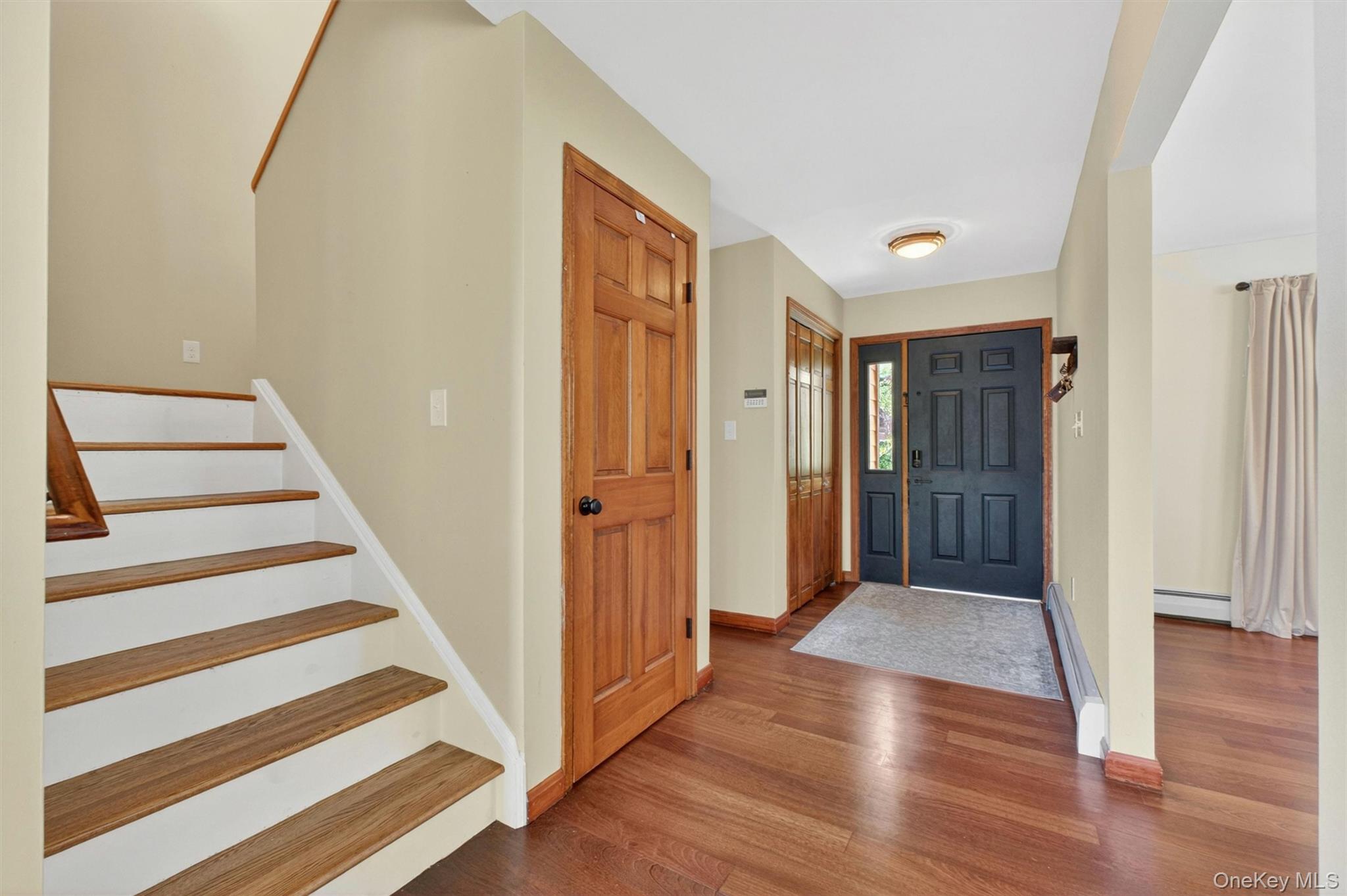 85 Ward Road Salt Point, NY 12578 - Photo 22 of 49 a view of a hallway with wooden floor and windows