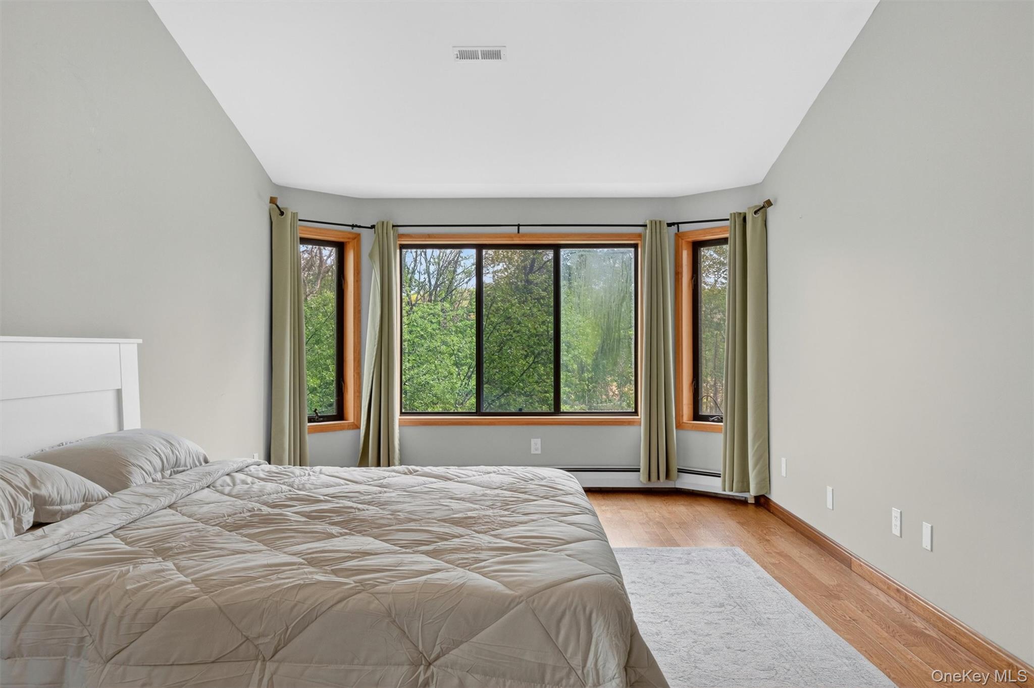 85 Ward Road Salt Point, NY 12578 - Photo 28 of 49 a bedroom with a large bed and a large window