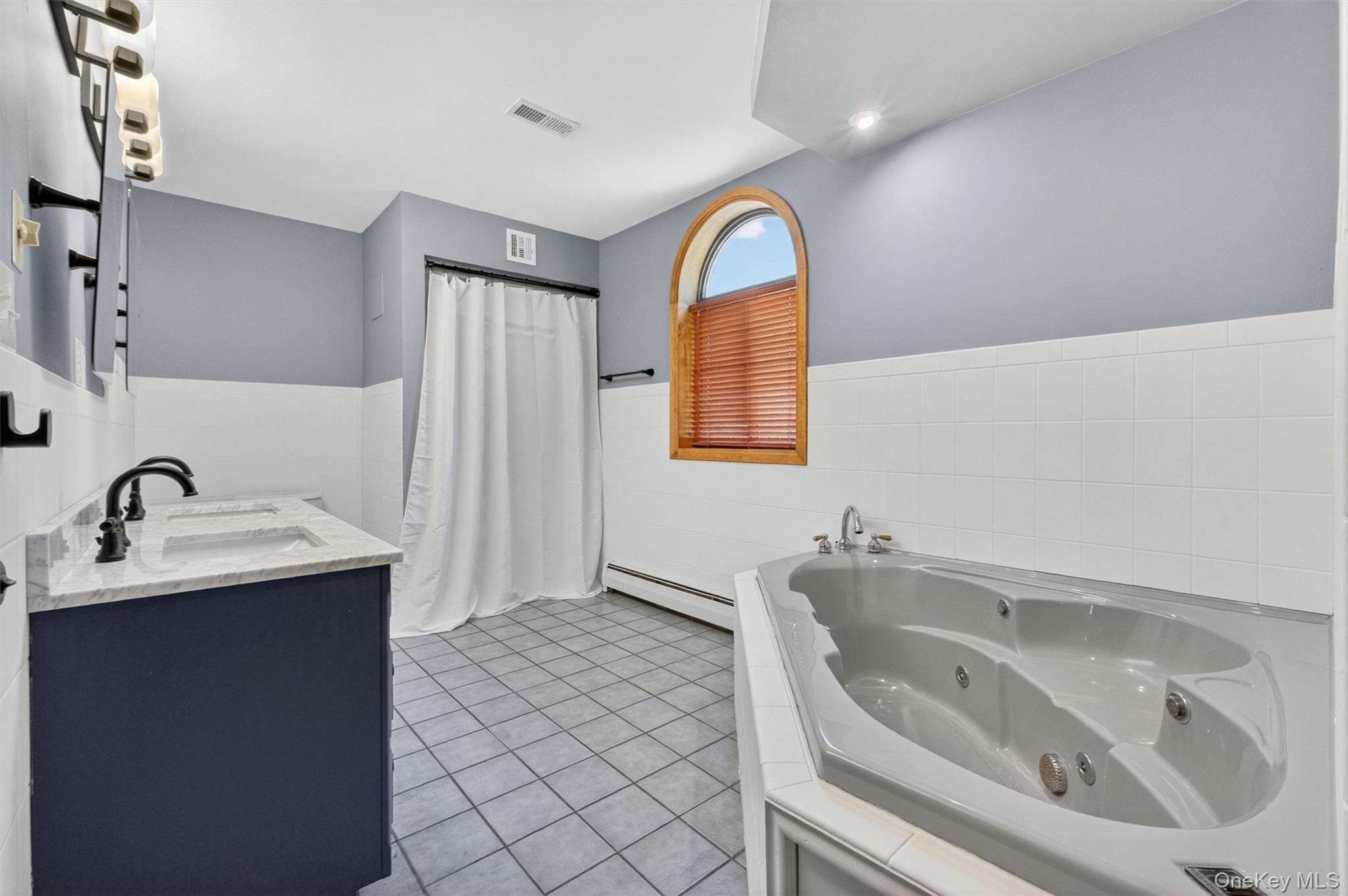 85 Ward Road Salt Point, NY 12578 - Photo 31 of 49 a bathroom with a sink a toilet and mirror