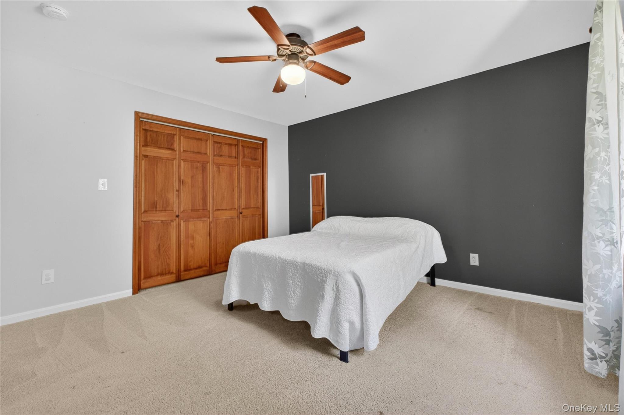85 Ward Road Salt Point, NY 12578 - Photo 33 of 49 a bedroom with a bed and a ceiling fan