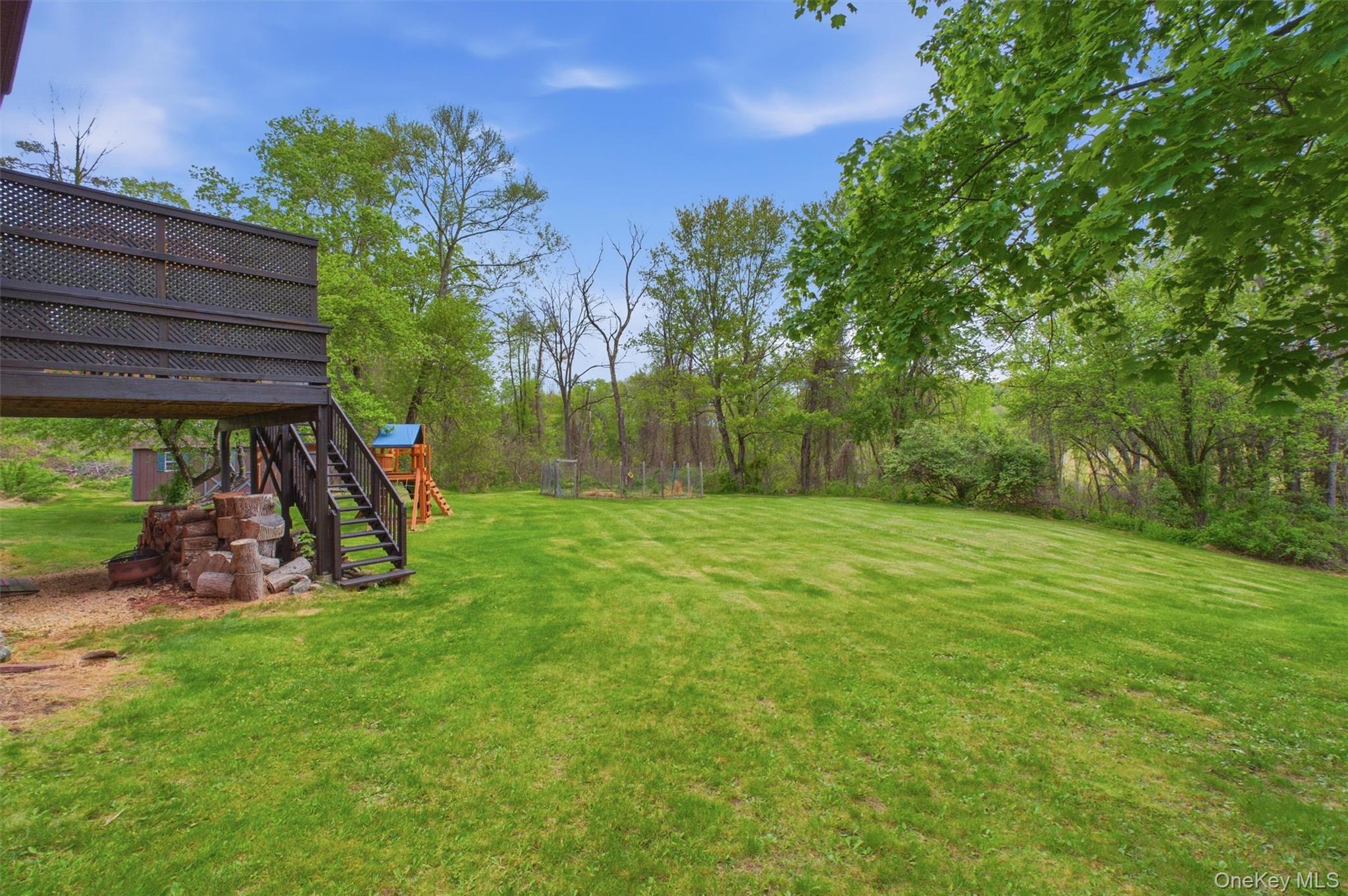 85 Ward Road Salt Point, NY 12578 - Photo 41 of 49 a view of a backyard with a garden and entertaining space