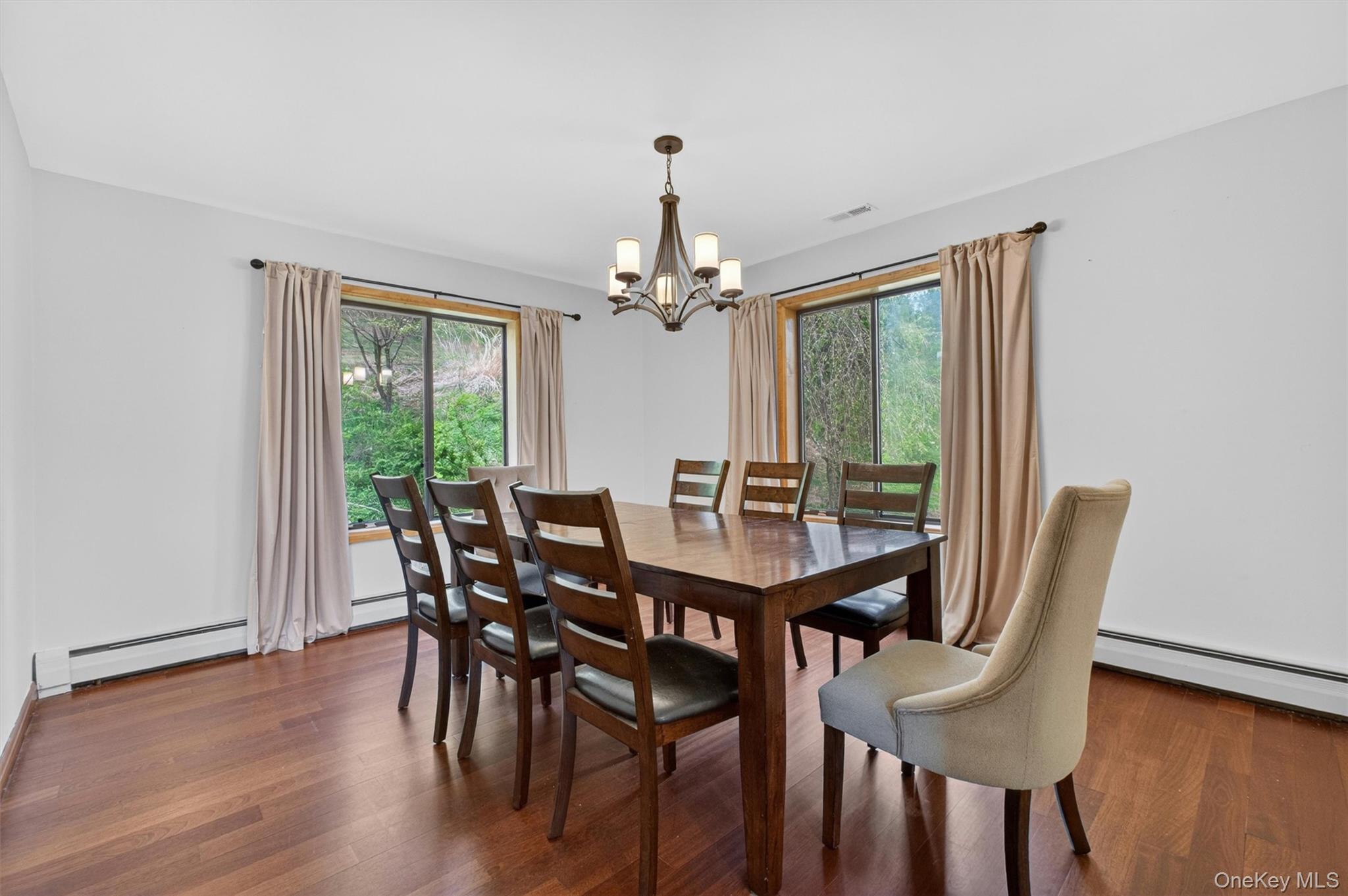 85 Ward Road Salt Point, NY 12578 - Photo 7 of 49 a view of a dining room with furniture window and wooden floor