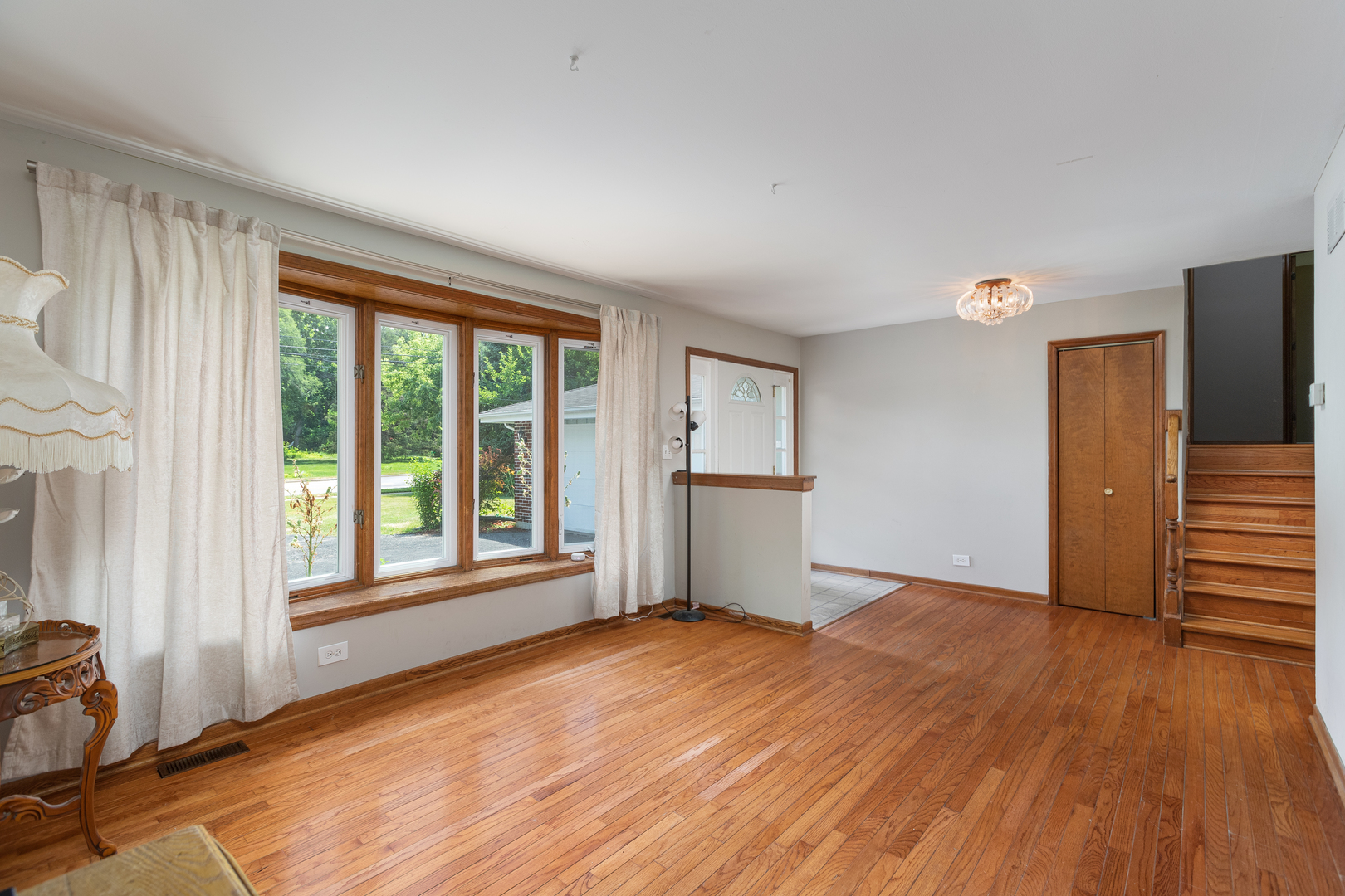 5740 Wolf Road Western Springs, IL 60558 - Photo 11 of 26 a view of empty room with wooden floor and fan