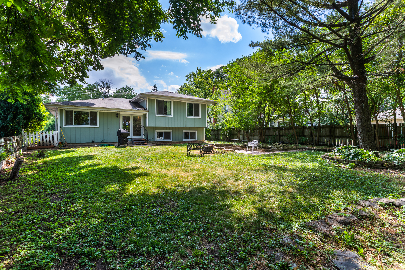 5740 Wolf Road Western Springs, IL 60558 - Photo 24 of 26 a view of a house with a yard porch and sitting area