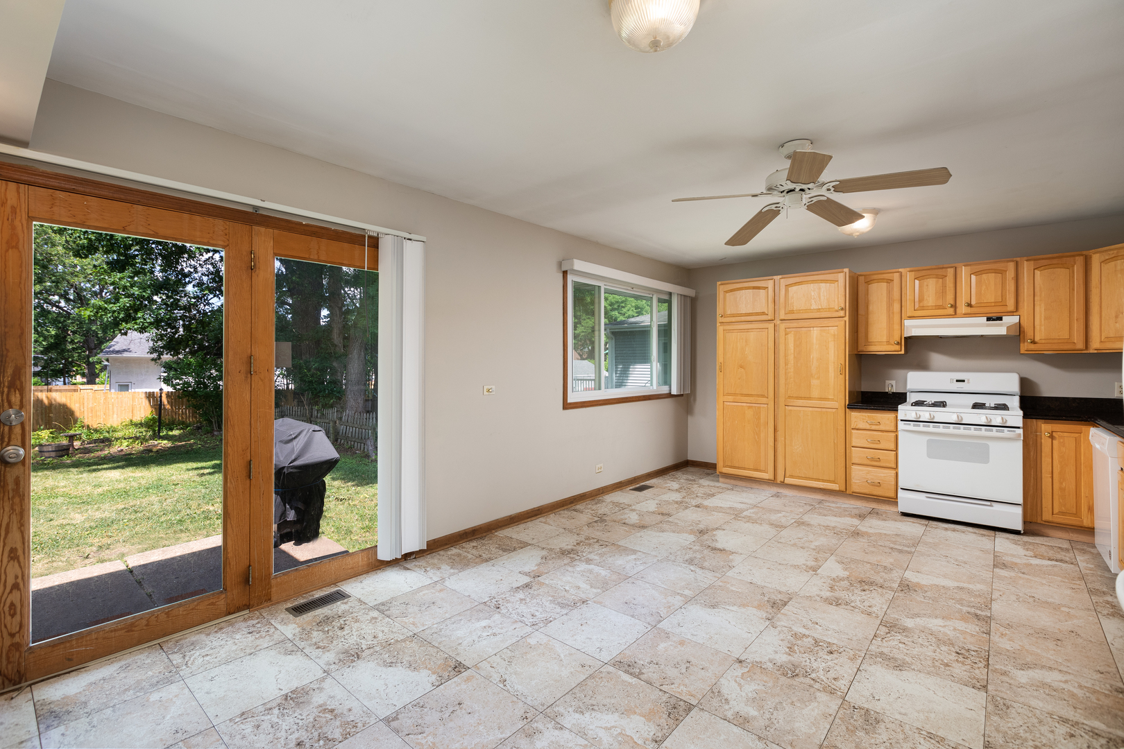 5740 Wolf Road Western Springs, IL 60558 - Photo 4 of 26 a view of a kitchen with a stove cabinets and a kitchen