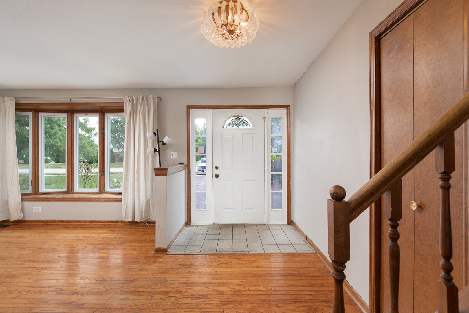 5740 Wolf Road Western Springs, IL 60558 - Photo 7 of 26 a view of an entryway with wooden floor