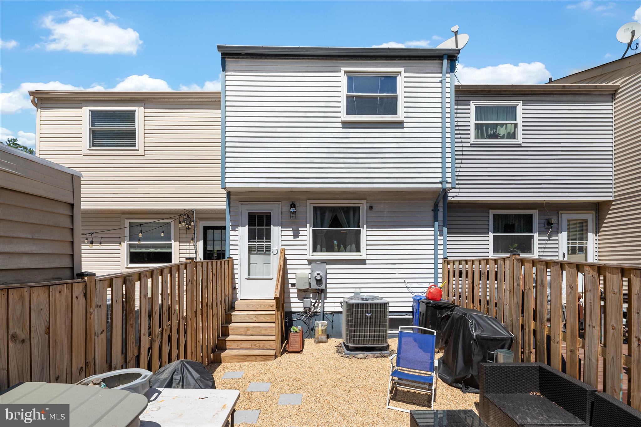 8307 Crestmont Circle Springfield, VA 22153 - Photo 23 of 33 a view of a house with wooden deck