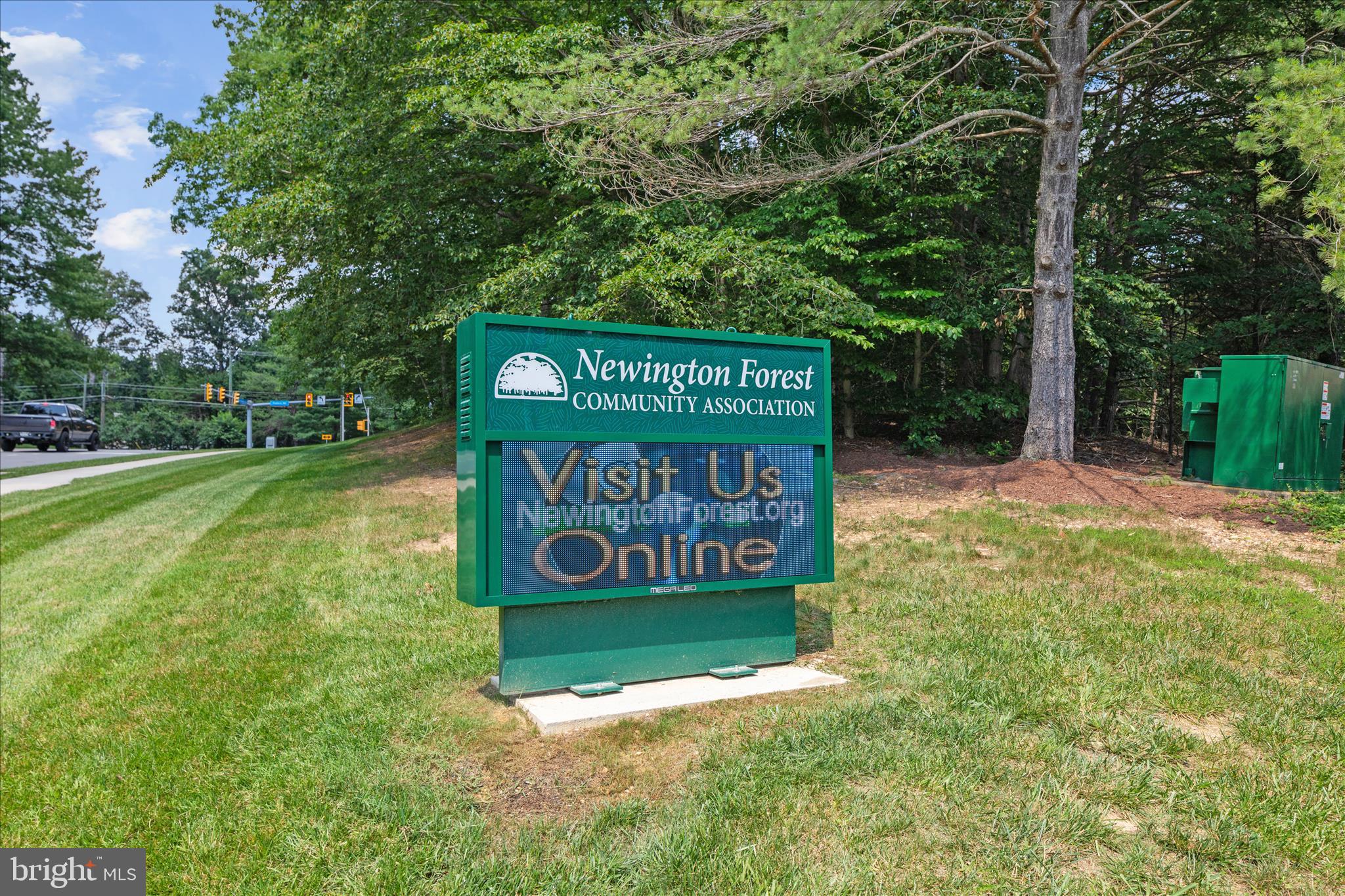 8307 Crestmont Circle Springfield, VA 22153 - Photo 29 of 33 a sign of golf club on a wall under a tree