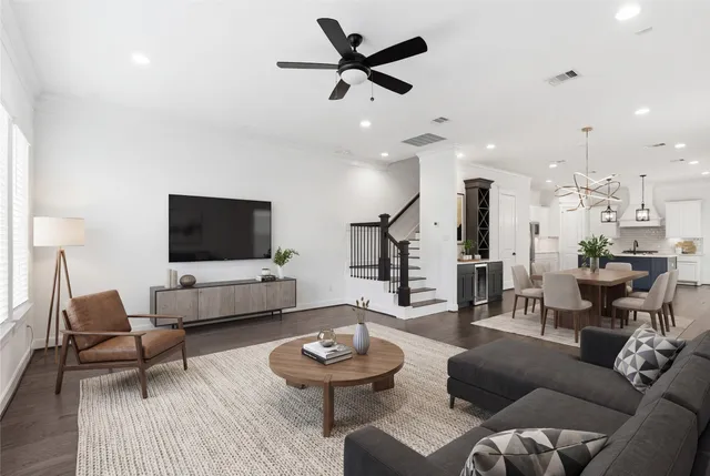 a view of a hallway with wooden floor and windows