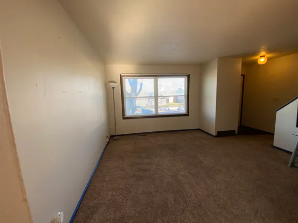 an empty room with windows