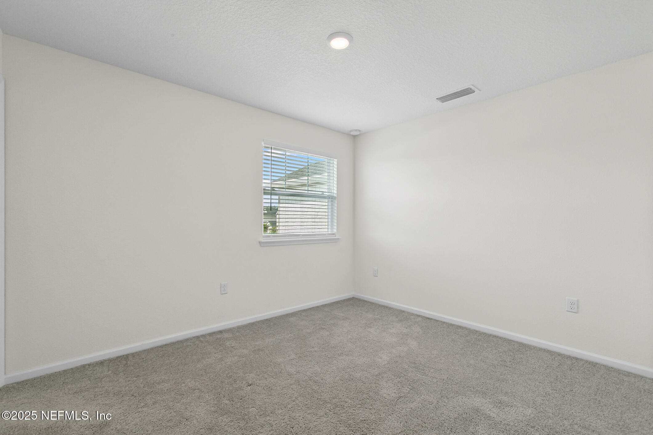 7690 Merchants Way Jacksonville, FL 32222 - Photo 27 of 52 an empty room with windows