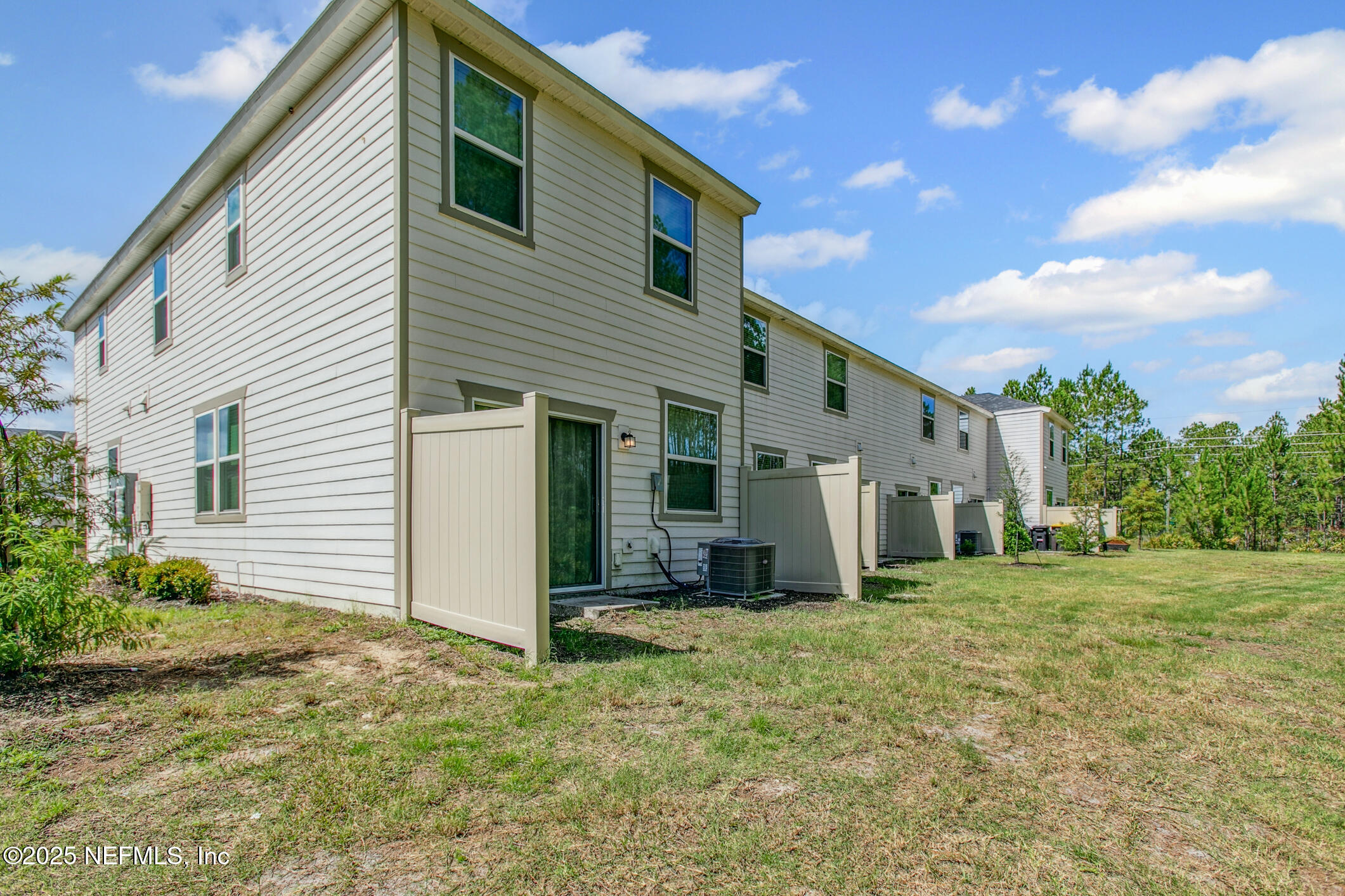 7690 Merchants Way Jacksonville, FL 32222 - Photo 36 of 52 a view of a house with backyard