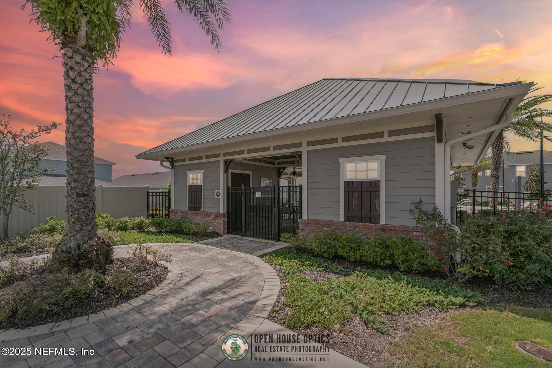 7690 Merchants Way Jacksonville, FL 32222 - Photo 40 of 52 front view of a house with a yard
