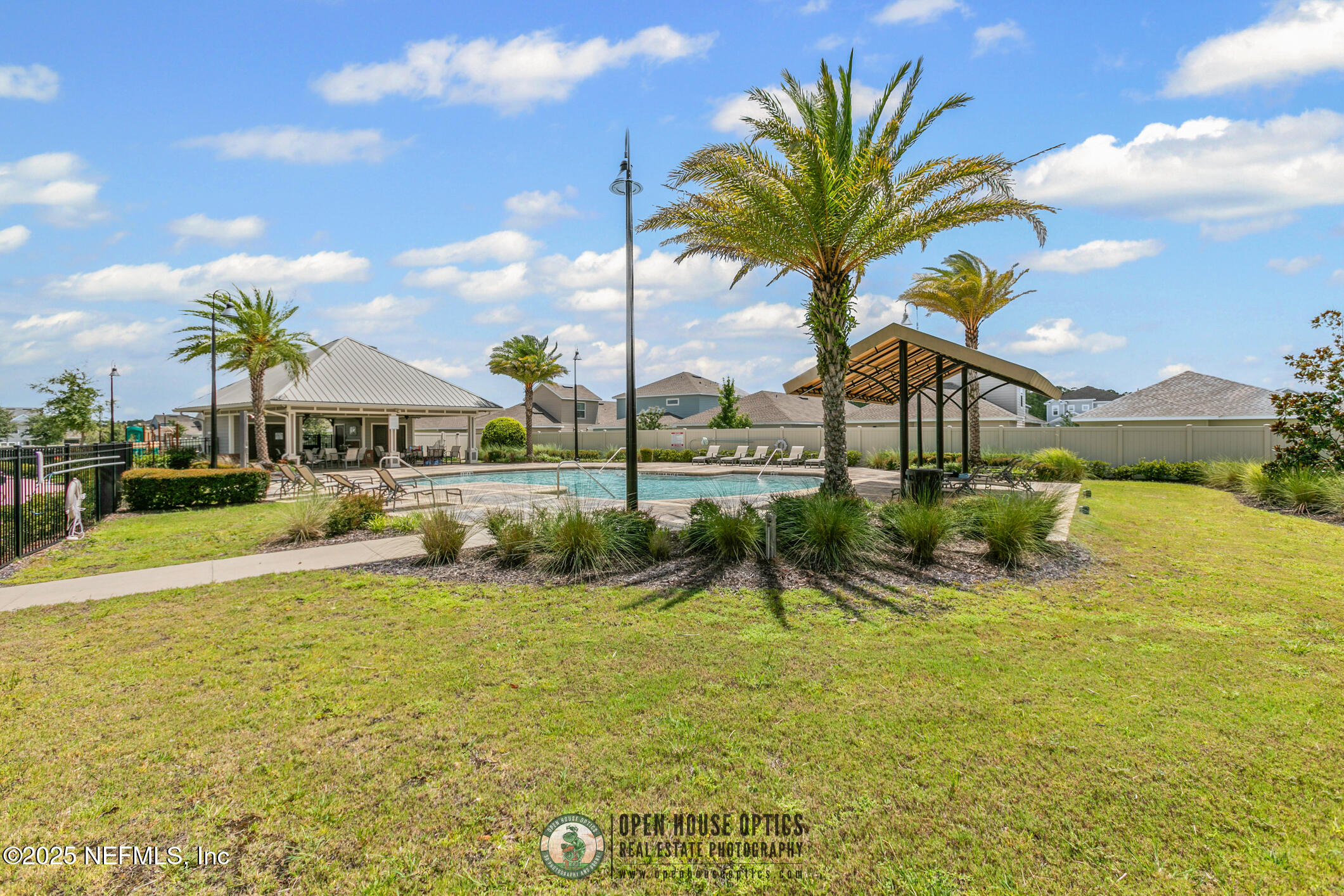 7690 Merchants Way Jacksonville, FL 32222 - Photo 41 of 52 a view of swimming pool with table and chairs