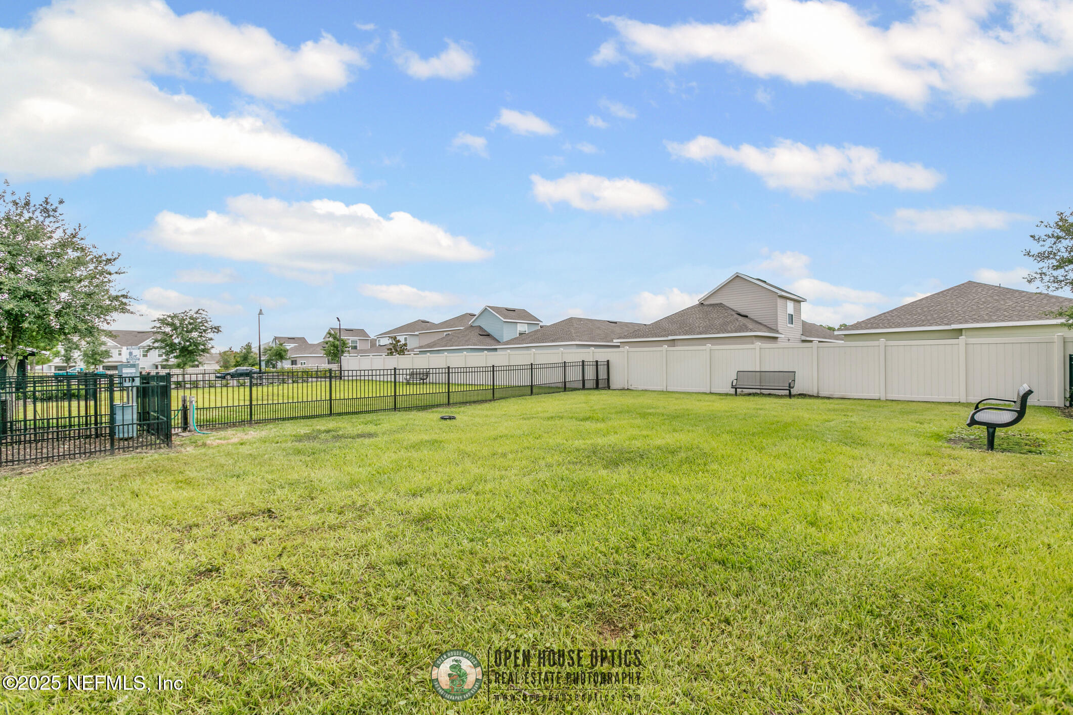 7690 Merchants Way Jacksonville, FL 32222 - Photo 47 of 52 a view of a house with a backyard and a tree