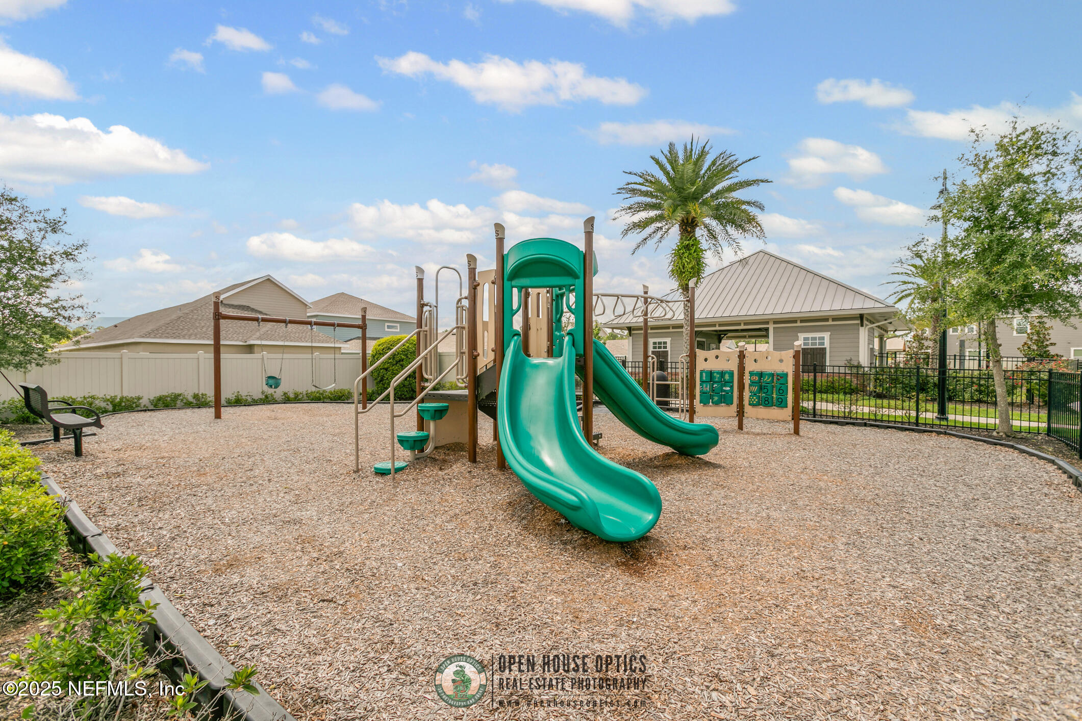 7690 Merchants Way Jacksonville, FL 32222 - Photo 49 of 52 a view of a house with a yard and slide