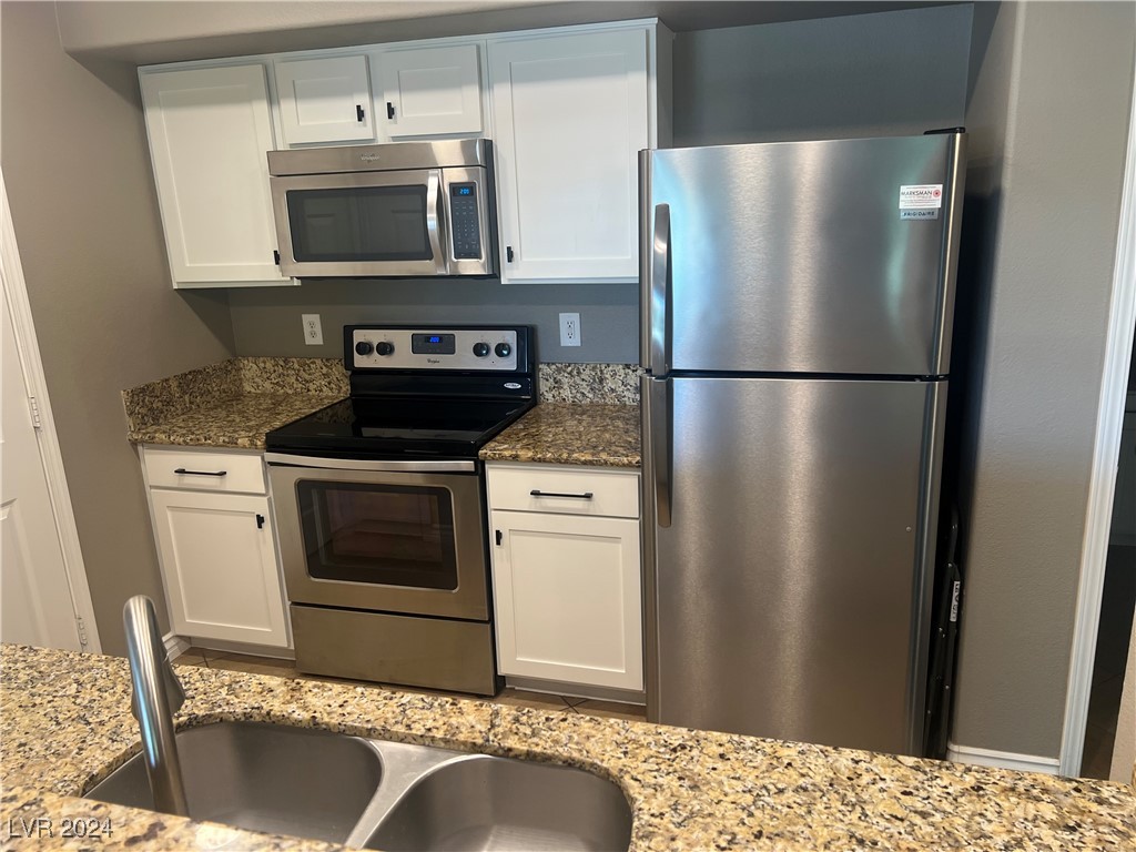 TOTALLY UPGRADED KITCHEN WITH GRANITE, STAINLESS A