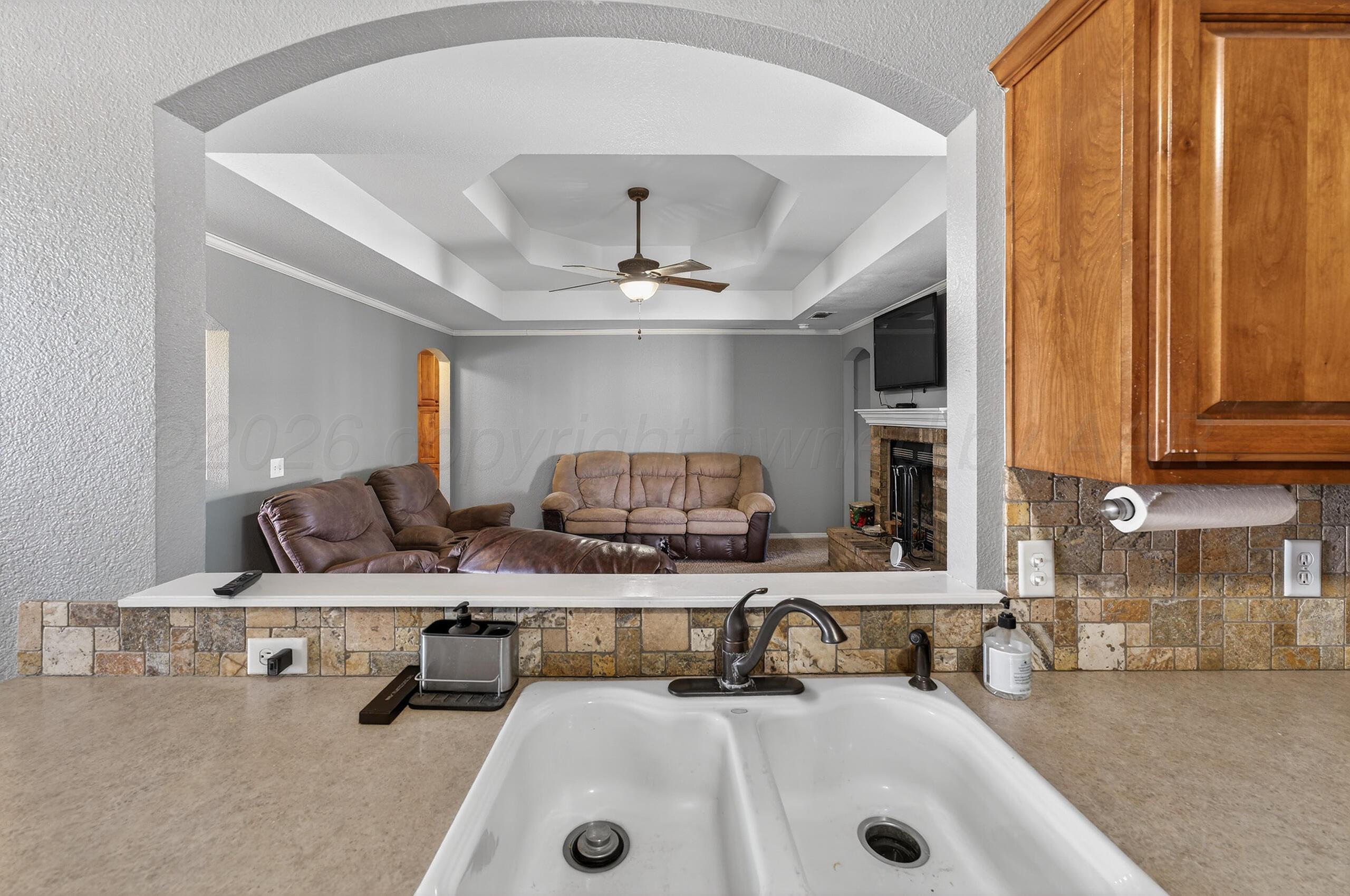 383 County Road 309 Panhandle, TX 79068 - Photo 11 of 35 a bathroom with a sink and a mirror