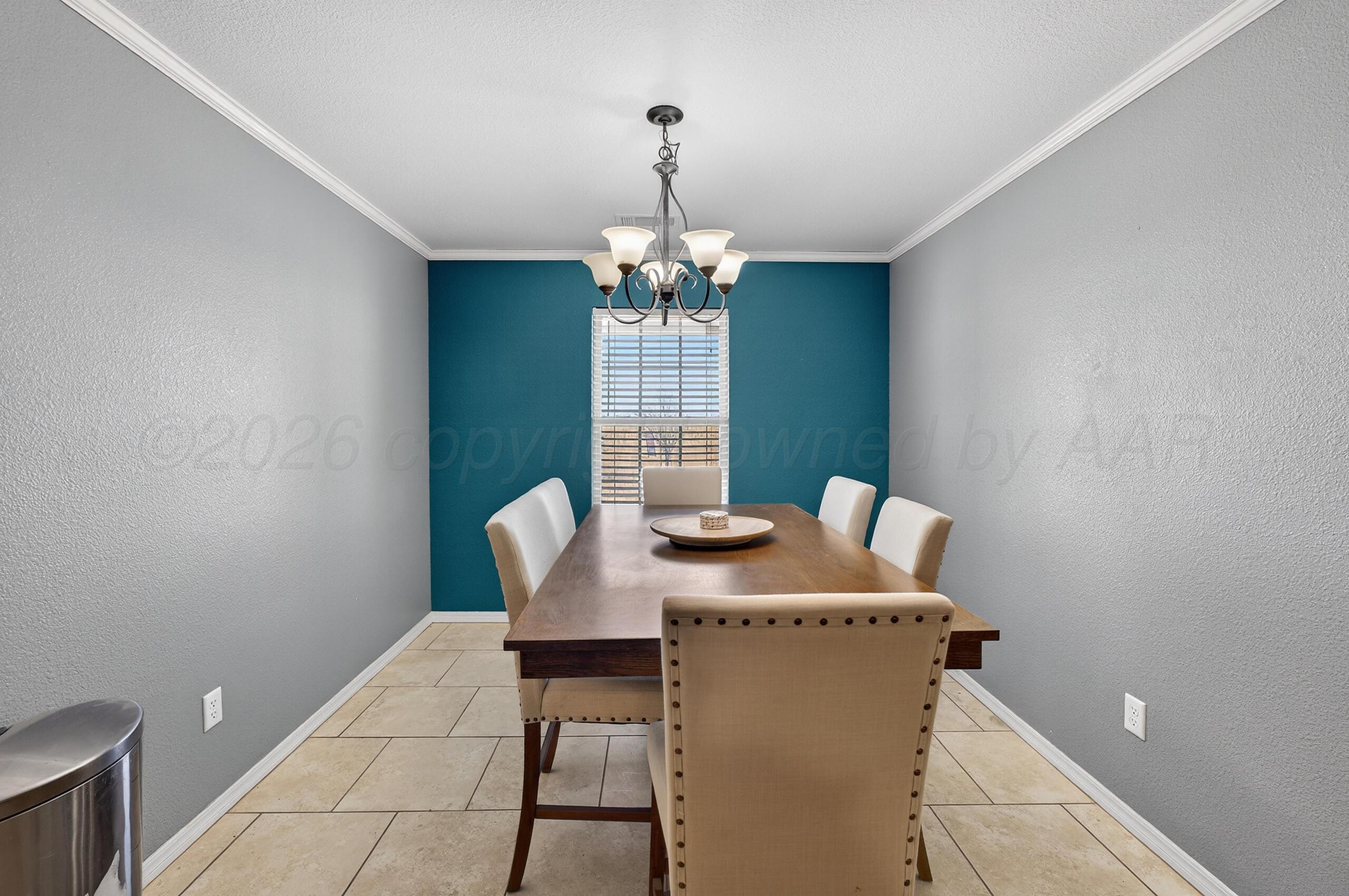 383 County Road 309 Panhandle, TX 79068 - Photo 12 of 35 a workspace with furniture and window