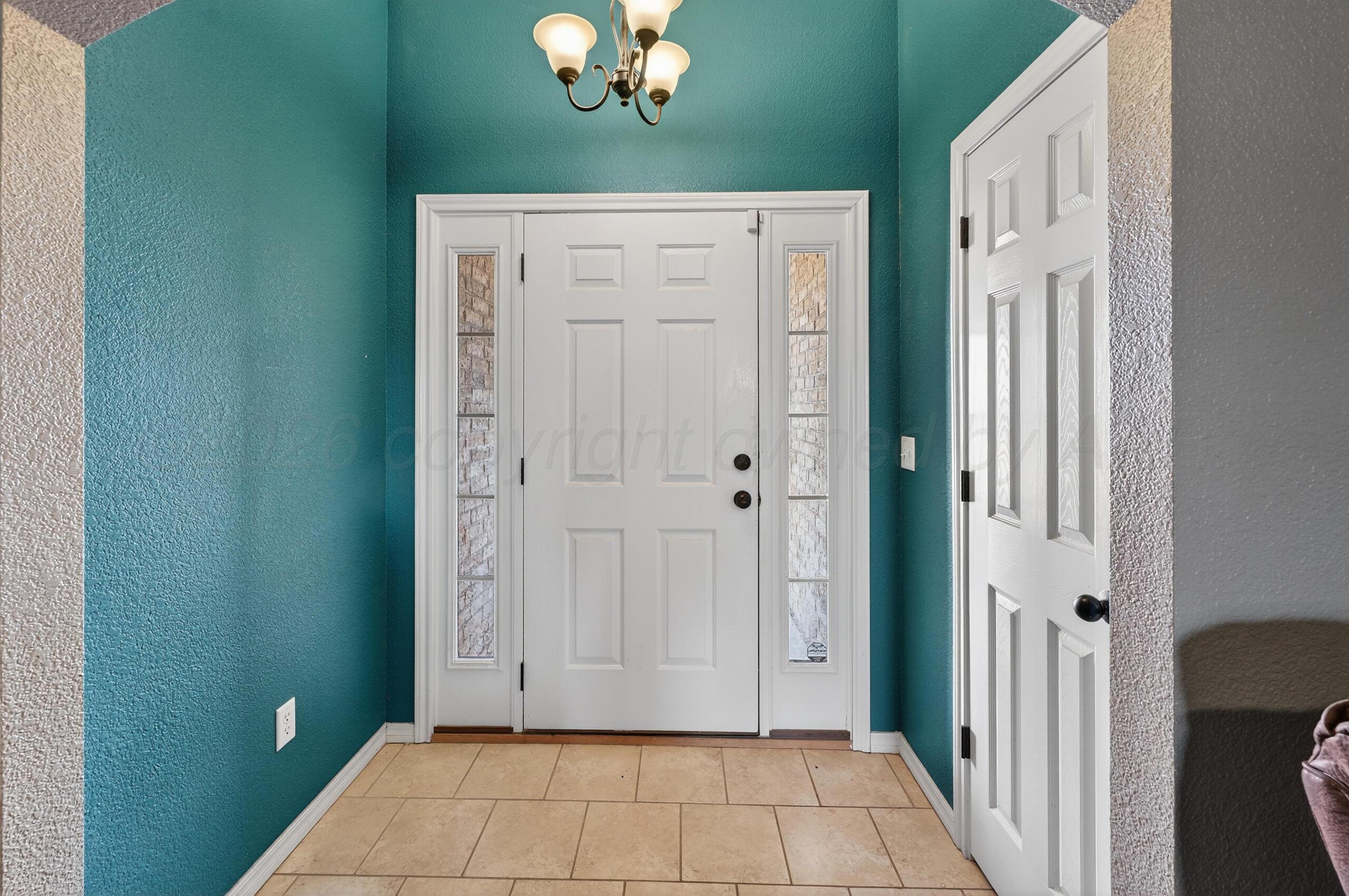 383 County Road 309 Panhandle, TX 79068 - Photo 4 of 35 a view of a hallway with entryway