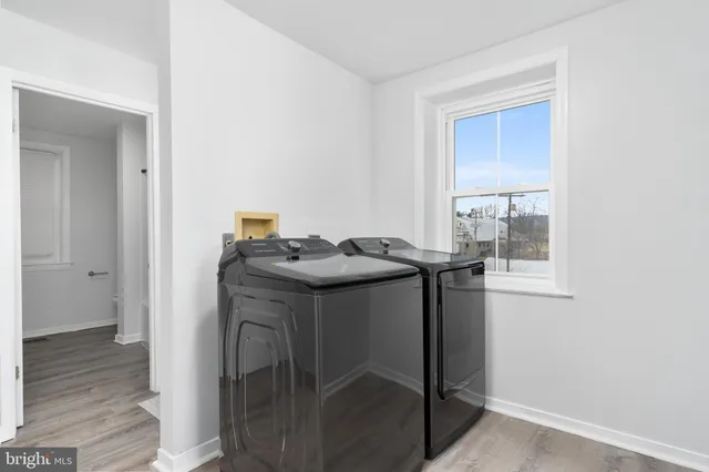a dining room with furniture and entryway