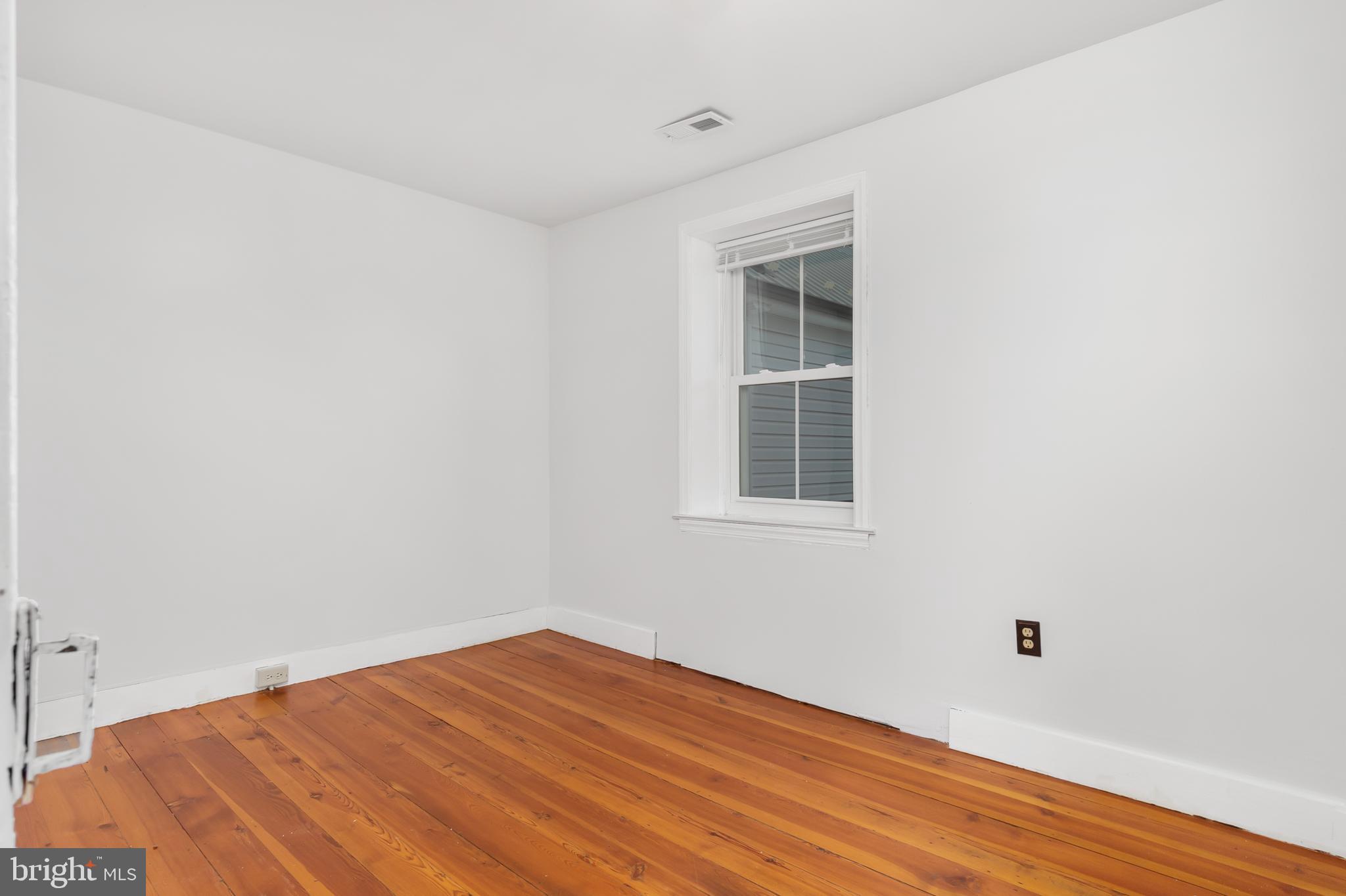 2730 Marker Road Middletown, MD 21769 - Photo 31 of 73 a view of empty room with wooden floor and fan