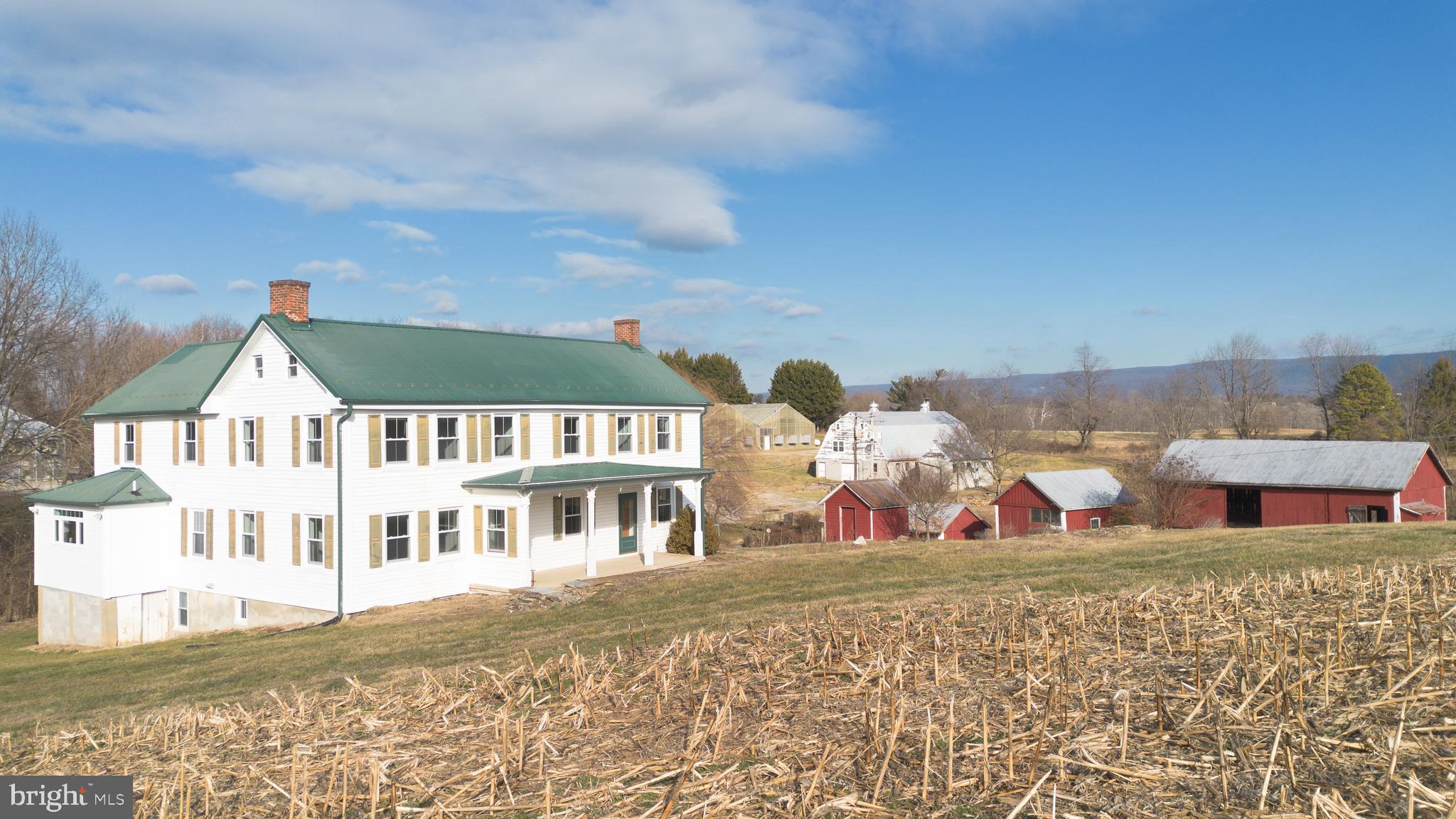 2730 Marker Road Middletown, MD 21769 - Photo 65 of 73 a view of a white house with a big yard and large trees