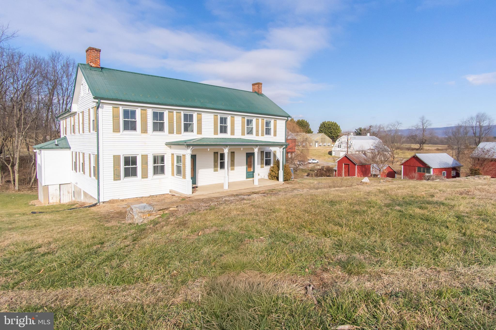 2730 Marker Road Middletown, MD 21769 - Photo 7 of 73 a group of people sitting in front of a building