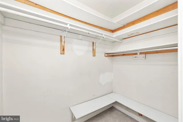 a view of a room with racks on the wall