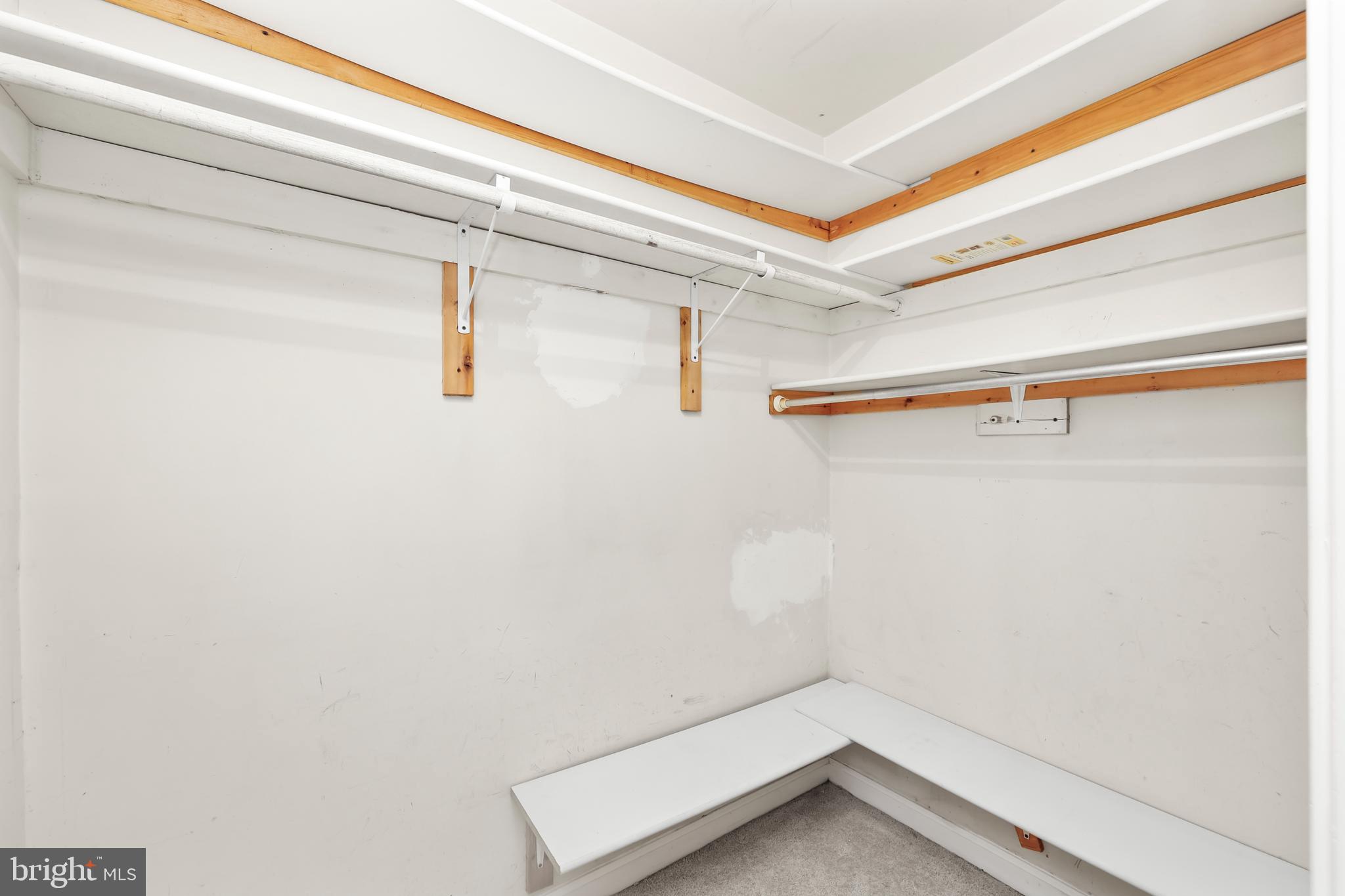 1802 Key Boulevard, Unit 9482 Arlington, VA 22201 - Photo 12 of 28 a view of a room with racks on the wall