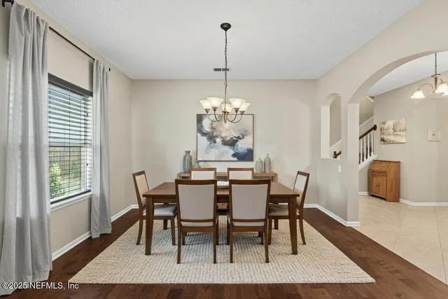 a stove top oven sitting inside of a kitchen