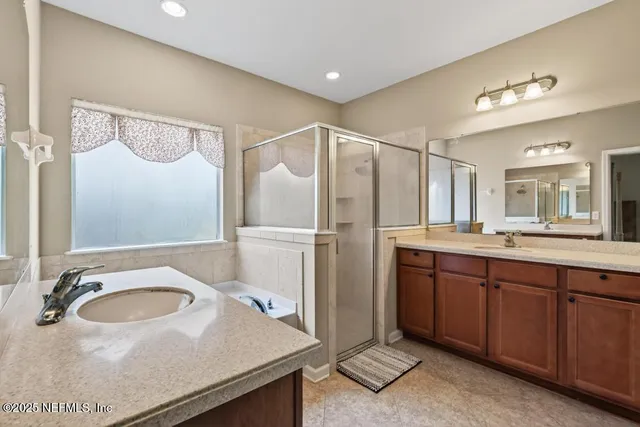 a view of a porch with furniture and a yard