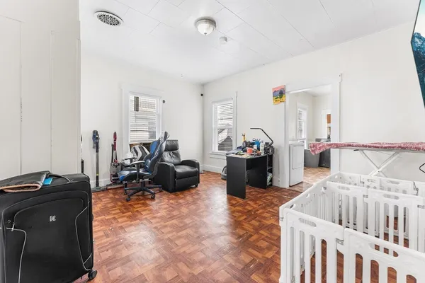 a room with furniture and a flat screen tv