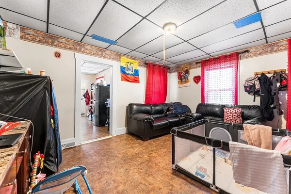 a room with lots of gym equipment