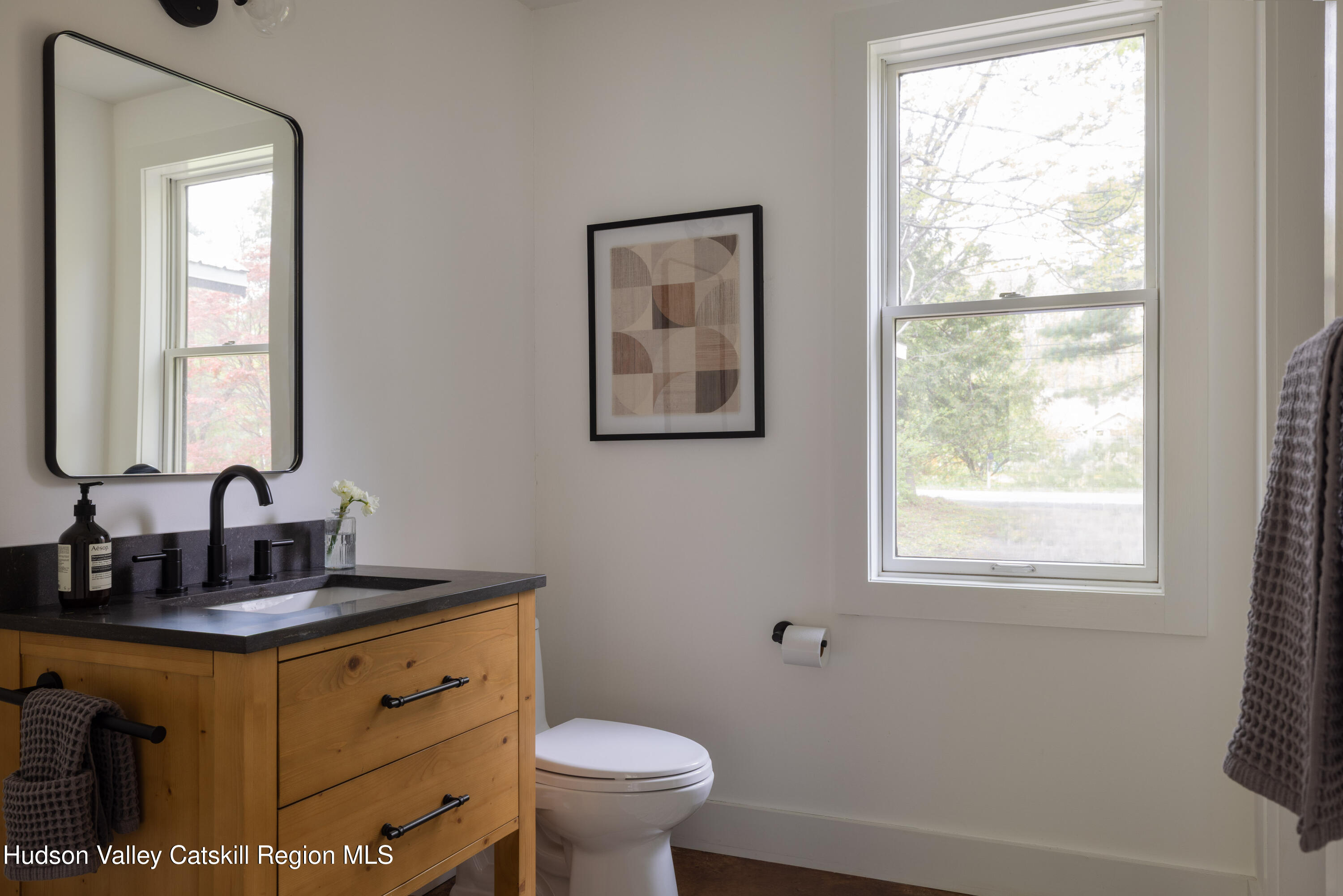 631 Granite Road Kerhonkson, NY 12446 - Photo 13 of 27 a bathroom with a toilet sink and window