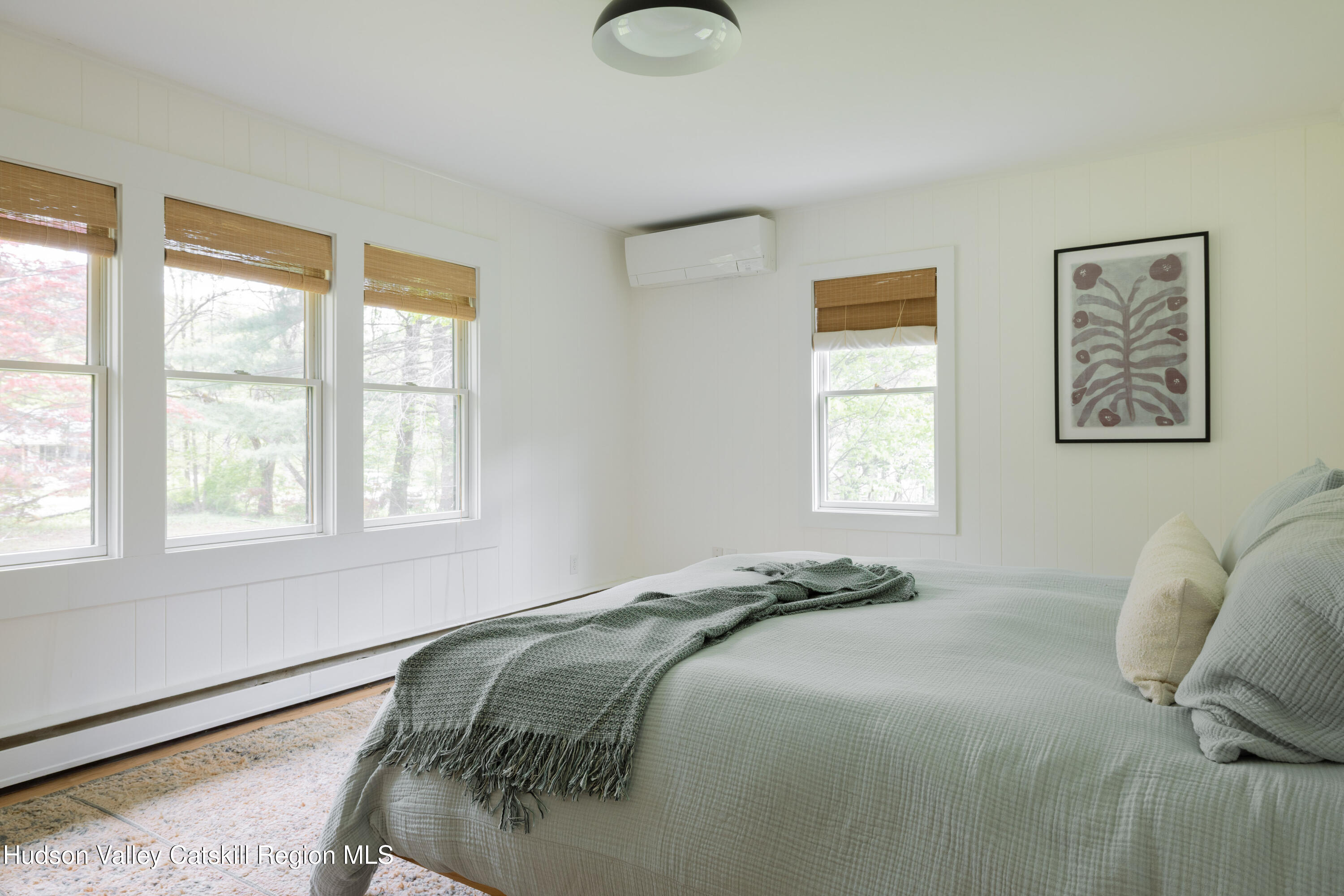 631 Granite Road Kerhonkson, NY 12446 - Photo 18 of 27 a bedroom with a bed and a window