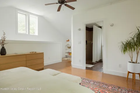 a room with furniture and a window
