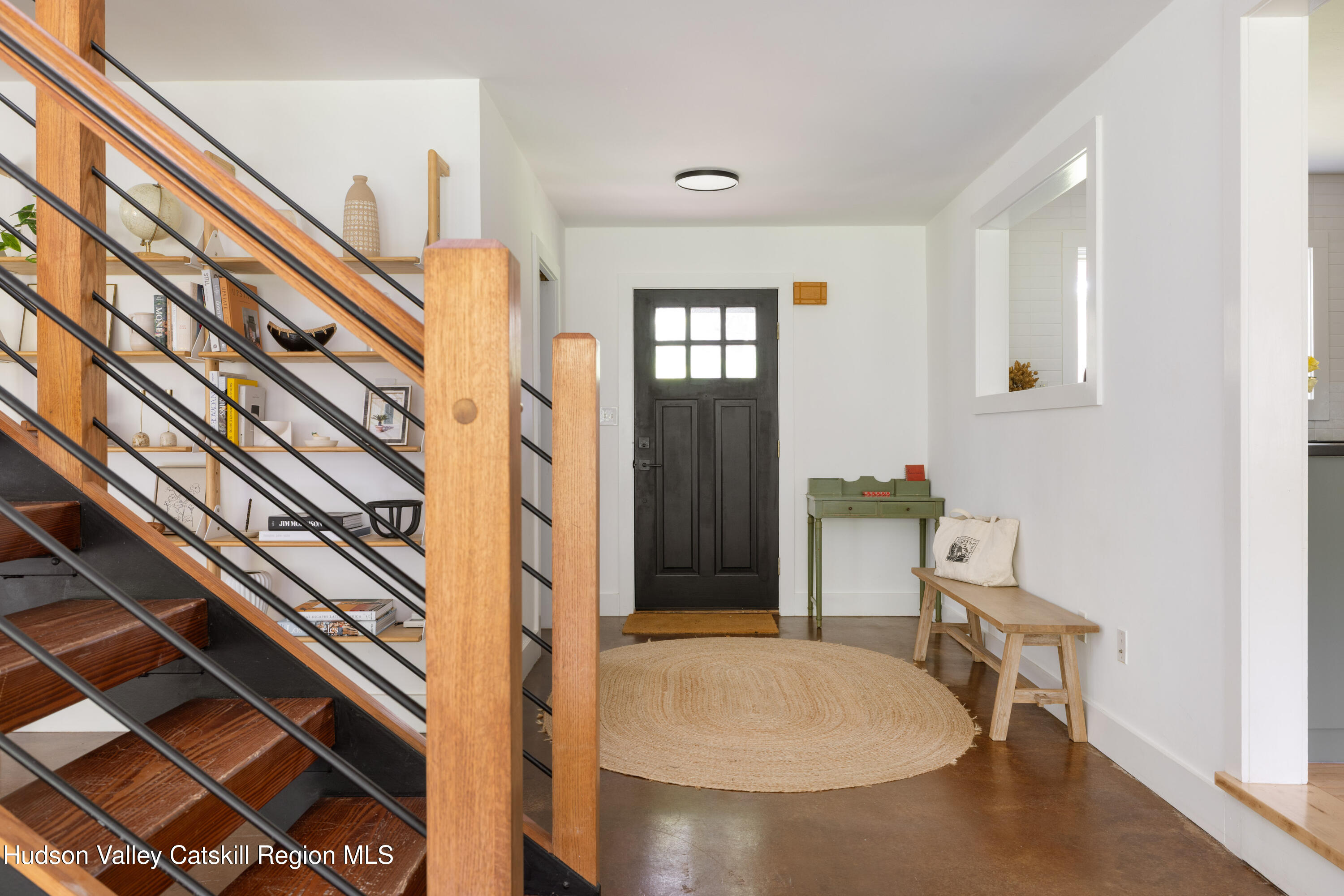 631 Granite Road Kerhonkson, NY 12446 - Photo 8 of 27 a view of a livingroom with furniture and staircase