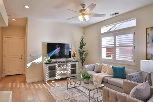 a living room with furniture and window