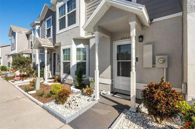 a view of a building with sitting area