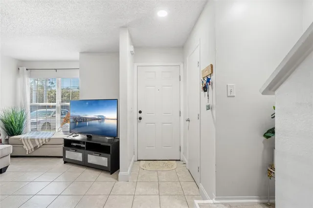 a kitchen with stainless steel appliances granite countertop a stove sink and cabinets