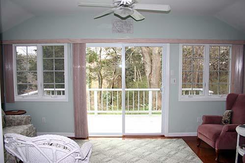 88 Pochet Road Orleans, MA 02653 - Photo 14 of 22 a living room with furniture and a window