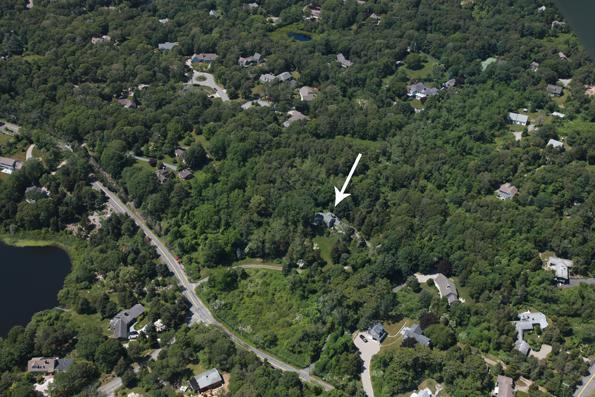88 Pochet Road Orleans, MA 02653 - Photo 22 of 22 an aerial view of a house with a yard