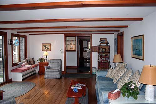 88 Pochet Road Orleans, MA 02653 - Photo 5 of 22 a living room with furniture and wooden floor