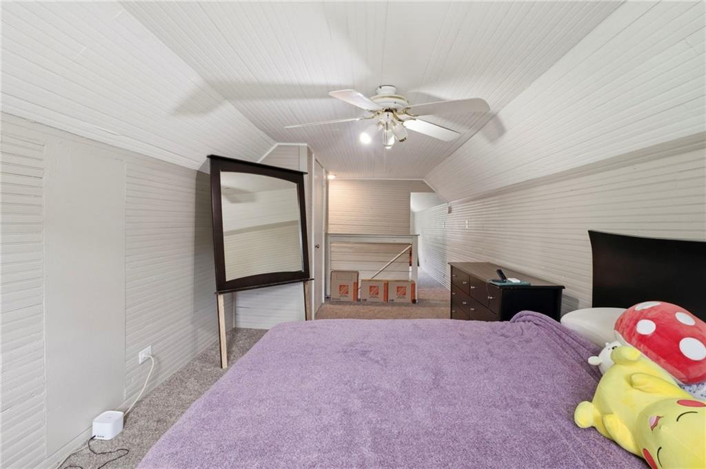 400 Sam Love Road Rocky Face, GA 30740 - Photo 23 of 29 a bedroom with furniture and a ceiling fan